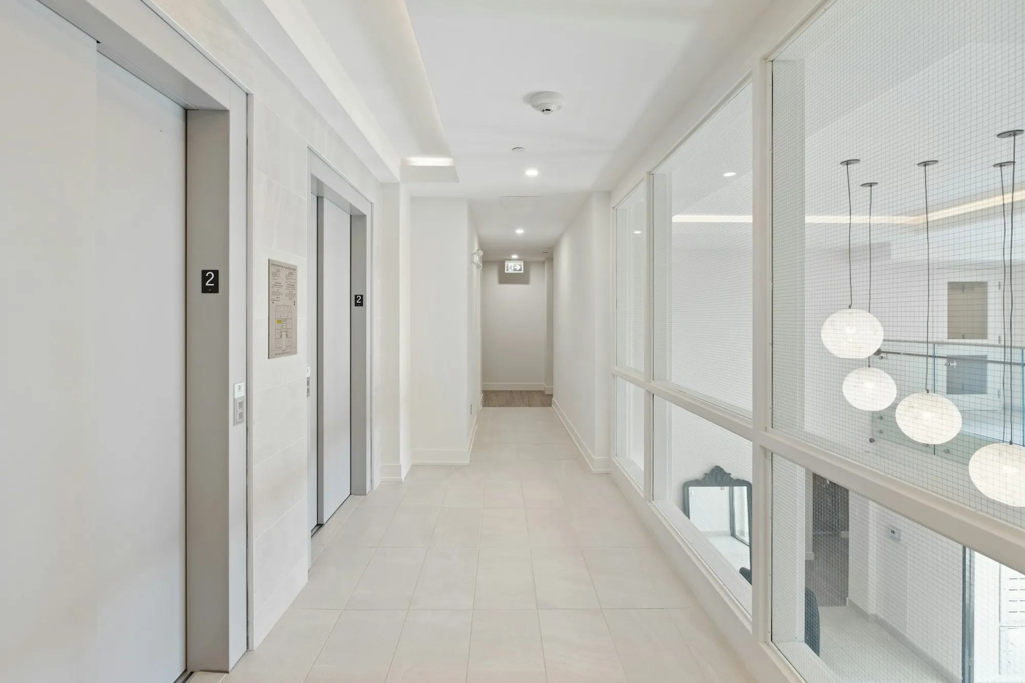 Bright common corridor of a strata apartment building